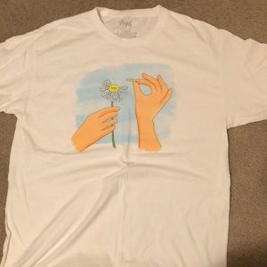 A Large white shirt,100%cotton, with a cool picture on the front P.S barely worn